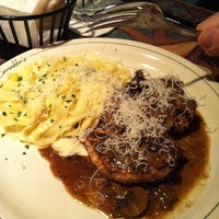 Photo taken at Carrabba&amp;#39;s Italian Grill by Kerry K. on 12/22/2011