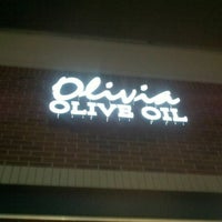 Photo taken at Olivia Olive Oil by Leland (. on 12/8/2011