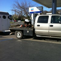 Photo taken at Chevron by ki r. on 3/4/2012