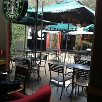 Photo taken at Starbucks Coffee by rene g. on 8/31/2011