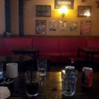 Photo taken at Shamrock Irish Pub 三叶草酒吧 by Gina L. on 5/13/2012