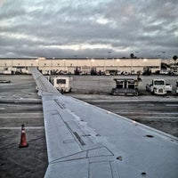 Photo taken at Gate 44J by Nessie on 7/28/2012