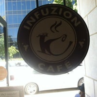 Photo taken at Infuzion Cafe by Amanda P. on 6/25/2012