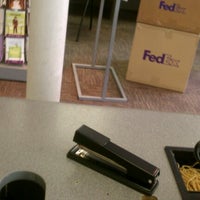 Photo taken at FedEx Office Print &amp;amp; Ship Center by JL J. on 7/2/2012