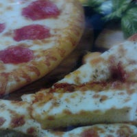 Photo taken at Little Caesars Pizza by Mario W. on 3/22/2012
