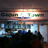 Photo taken at Cajun Town Café by Eric H. on 8/12/2011