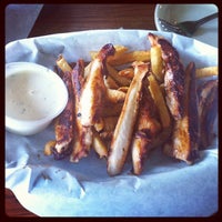 Photo taken at Snuffers by Julie G. on 9/2/2012