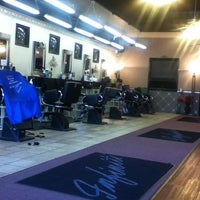 Photo taken at Infinity Barbershop by Charlie H. on 1/9/2012