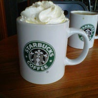 Photo taken at Starbucks by Lyssie P. on 1/21/2012