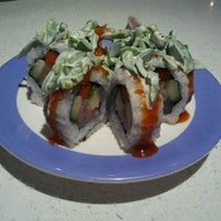 Photo taken at Blue C Sushi by Jon W. on 1/12/2012