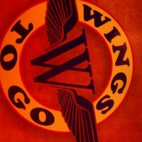 Foto tirada no(a) Wings To Go por Aaron W. em 10/23/2011