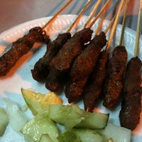 Photo taken at Fatman Satay Somerset by Isaac L. on 2/14/2011