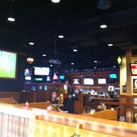 Photo taken at Buffalo Wild Wings by Krissy C. on 3/20/2012