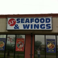 Photo taken at JJs Seafood and Wings by Ryan B. on 3/12/2012