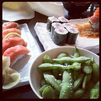 Photo taken at Tsunami Restaurant &amp; Sushi Bar by Carlos M. on 11/17/2011