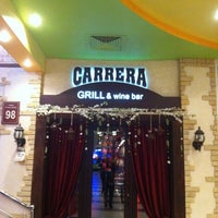 Photo taken at Carrera by Max K. on 4/3/2012