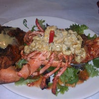 Photo taken at MaSani Gourmet Southern Cuisine by John T. on 1/8/2012