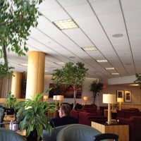 Photo taken at United Global First Lounge by Steve H. on 5/6/2012