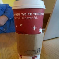 Photo taken at Starbucks by Erin G. on 12/28/2011