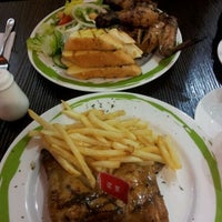 Photo taken at Barcelos Flame Grilled Chicken by Eddei R. on 10/27/2011