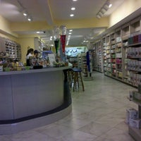 Photo taken at Tisane Pharmacy &amp;amp; Cafe by Becki W. on 12/23/2011