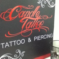 Photo taken at Candle Tattoo by Well S. on 5/25/2012