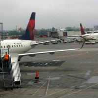 Photo taken at Gate C18 by Shawn B. on 5/16/2012