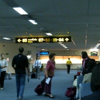 Photo taken at Gate 68 by Kritsana T. on 5/29/2011