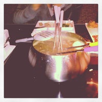Photo taken at The Melting Pot by Ambriss R. on 5/1/2012
