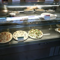 Photo taken at Homemade Pizza Co by Mel C. on 6/4/2012