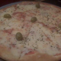 Photo taken at Pizza Pizzuela by Jomat R. on 2/3/2012