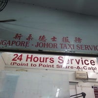 Photo taken at Singapore - Johor Taxi Service (Taxi Stand) by Annalicia Maria B. on 2/16/2012