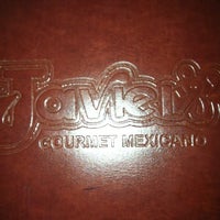 Photo taken at Javier&amp;#39;s Gourmet Mexicano by Emily A. on 2/19/2012