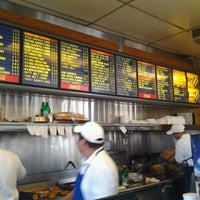 Photo taken at Olympian Burgers by Johnny M. on 9/12/2011