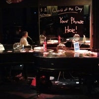 Photo taken at Jolly&amp;#39;s American Beer Bar and Dueling Pianos by Will B. on 1/14/2012