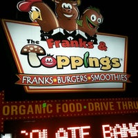 Photo taken at Franks &amp;amp; Toppings by Binh N. on 12/31/2011