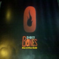 Photo taken at Smokey Bones Bar &amp;amp; Fire Grill by Arianna M. on 11/20/2011