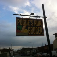 Photo taken at Pogue&amp;#39;s Run Grocer by Jay P. on 12/31/2010