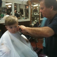 Photo taken at Park Slope Barbers by Lynn H. on 7/1/2011