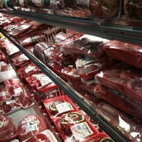 Photo taken at McKinnon&#39;s Meat Market by m j. on 12/23/2011
