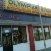 Photo taken at Olympian Burgers by Enrique C. on 9/18/2011