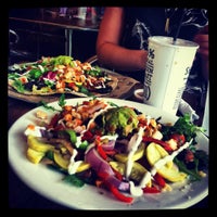 Photo taken at Sharky&amp;#39;s Woodfired Mexican Grill by Cathy L. on 9/6/2012
