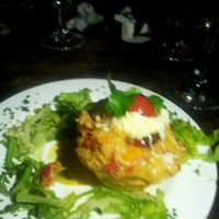 Photo taken at Degusti Bar &amp; Restaurante by Rochelle I. on 9/9/2012
