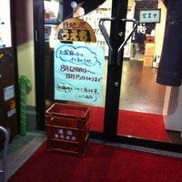 Photo taken at うえも商店 by 真 on 8/4/2012