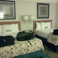 Photo taken at La Quinta Inn &amp; Suites Orlando UCF by &quot;ChongDo&quot; Rik @. on 12/4/2011
