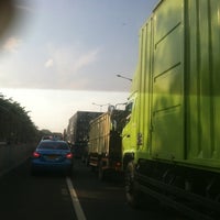 Photo taken at Jalan Tol Lingkar Luar Jakarta Seksi W1 (JORR W1) by Andriono on 5/4/2012