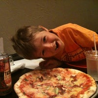 Photo taken at Stone Hearth Pizza by Todd S. on 9/1/2012