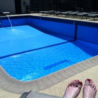 Photo taken at 450 Briar Rooftop Pool by Amy W. on 5/25/2012