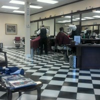 Photo taken at Gino&amp;#39;s Classic Barber Shoppe by Martin J. on 4/18/2012