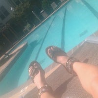 Photo taken at Pool @ Uptown Square by Marissa G. on 7/17/2011